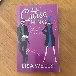 Purple 'It's a Curse Thing' Book by Lisa Wells